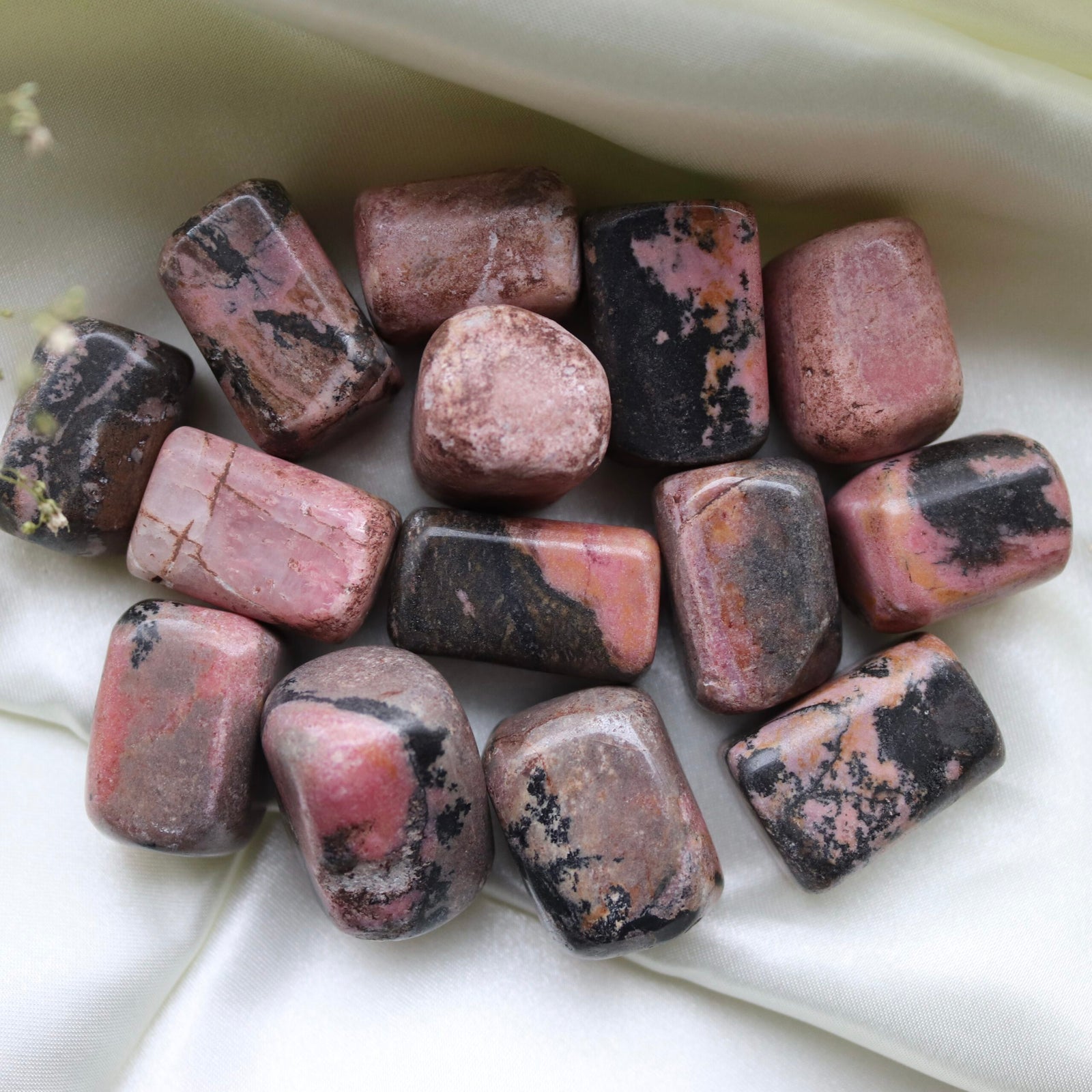 rhodoniet trommelstenen gepolijst